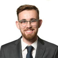 Headshot of Nicholas Clark.