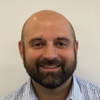 Headshot of Domenic DiSisto.