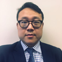 Headshot of Xi Huang.