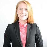 Headshot of Adrienne Macdonald.