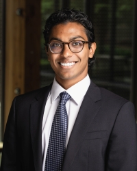 Headshot of Adam Fernandes.